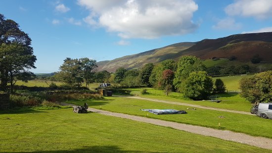 Car free family camping streamside grass pitches